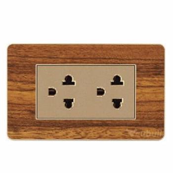 TOMACORRIENTE DOBLE C/T PLACA MADERA CUBULL