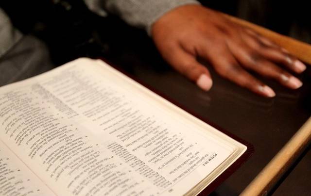 State Passes Law Letting Teachers Use Bibles In The Classroom. Do They Have Your Support? 102311snHandDetail - State Passes Law Letting Teachers Use Bibles In The Classroom. Do They Have Your Support?