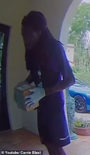 Heart of gold: FedEx delivery man Justin Bradshaw, 28, took the time to sanitize a package to protect a young girl from coronavirus after seeing a warning sign on the family