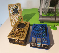 Raspberry Pi 4 case with break-out GPIO tab + fan versions 3D model
