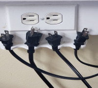 Wall outlet with plug holders 3D model