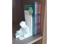 Simple book stand with a boy reading 3D model