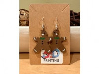 Bitten gingerbread man earring 3D model