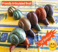Friendly articulated snail with 12 different shells 3D model