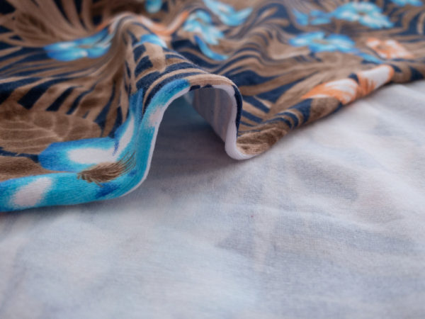 Designer Deadstock – Cotton/Spandex Jersey – Hibiscus - Brown/Blue/Orange
