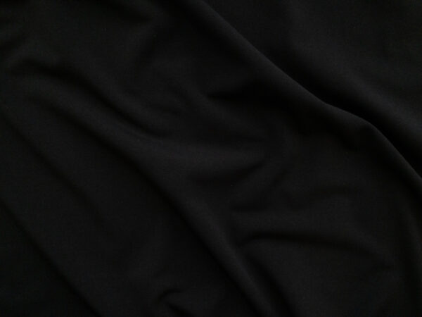 Free Photo  Black crumpled spandex soft fabric surface texture