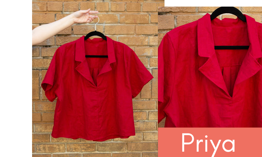 A red, short sleeved, collared shirt made of linen fabric displayed on a hanger. 