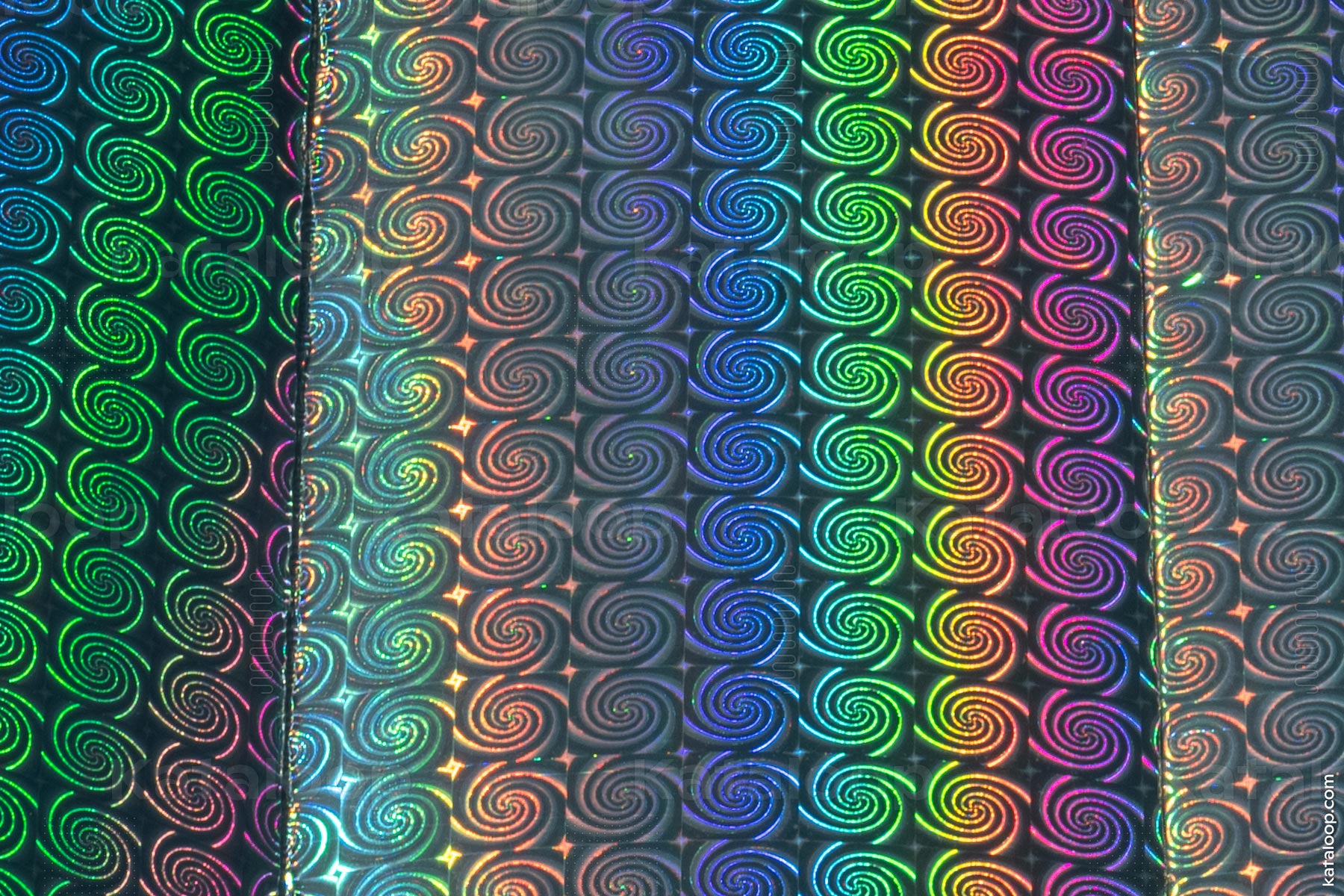 Colorful holographic patterns on reflective surface
