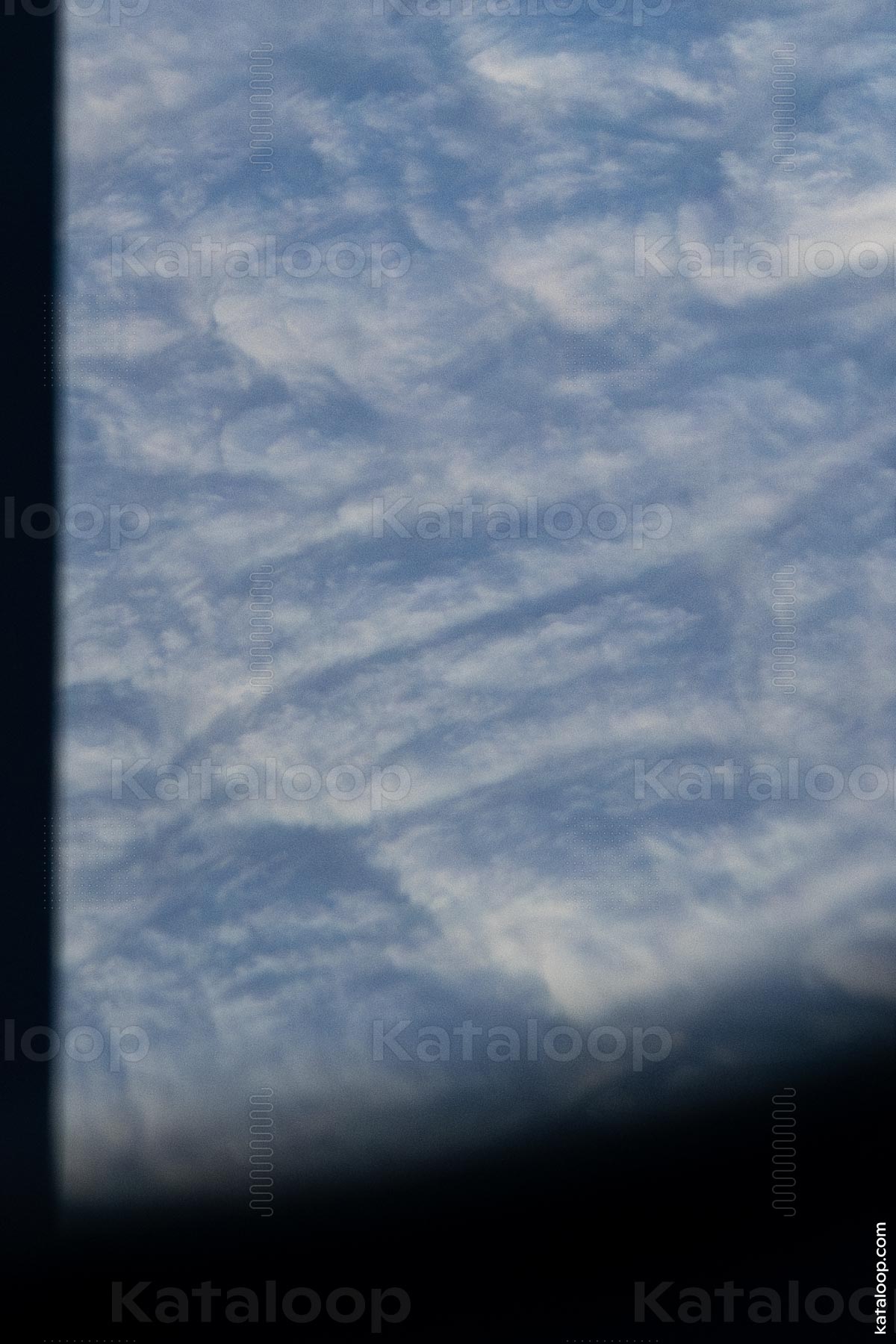 Aerial view of cloudscape from airplane window