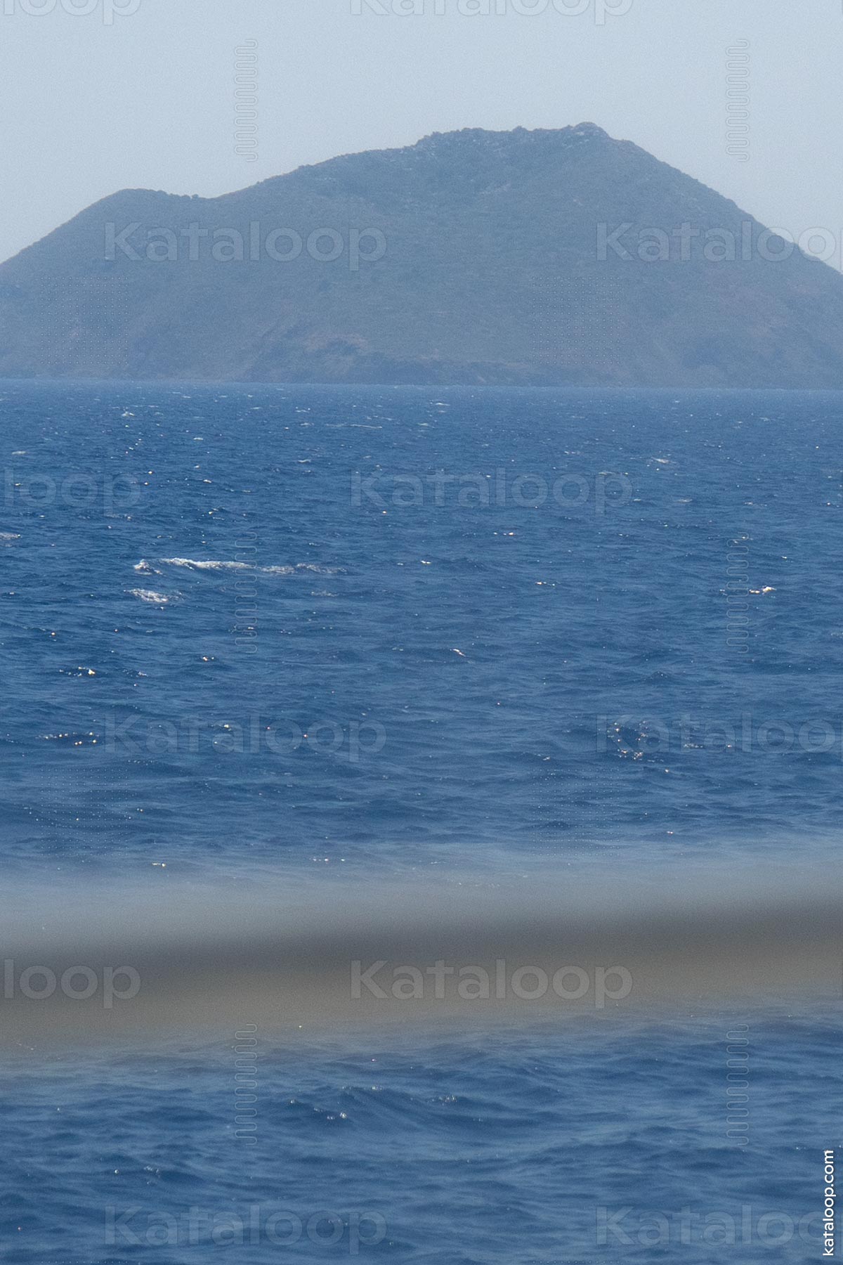 View of Strongyli Island from ferry window