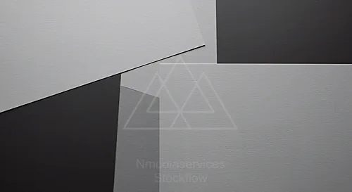 Abstract composition of textured gray paper sheets on dark background — 8K royalty-free background stock photo