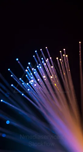 Close-up of glowing fiber optic strands in various colors — 8K royalty-free background stock photo