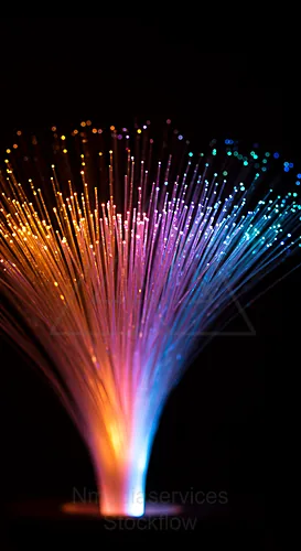 Colorful fiber optic lights creating a vibrant display against a dark background — 8K royalty-free background stock photo