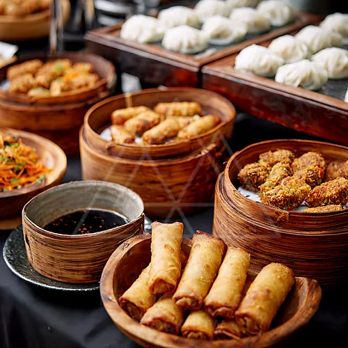 Variety of dim sum dishes served in bamboo steamers — 4K royalty-free catering events stock photo