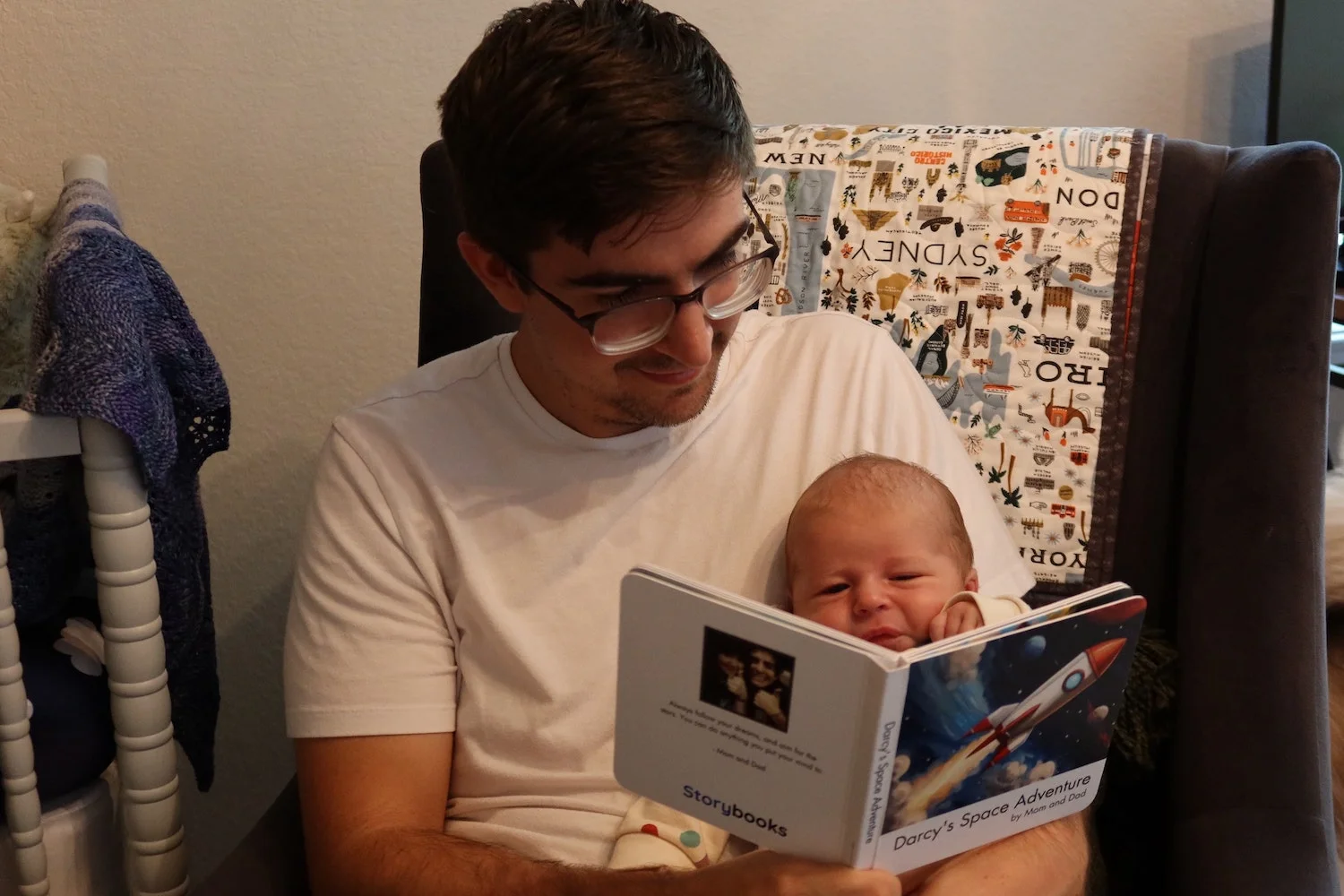 dad reading book to son