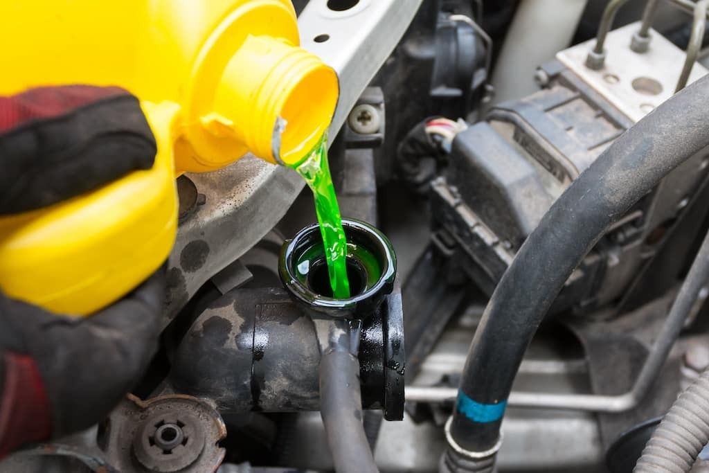 green-coolant-pouring-into-engine.jpeg