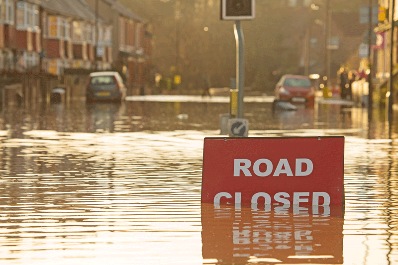 Flooded street due to poor stormwater management