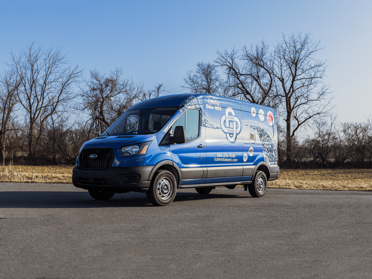 A sprinter van with a blue full vehicle wrap