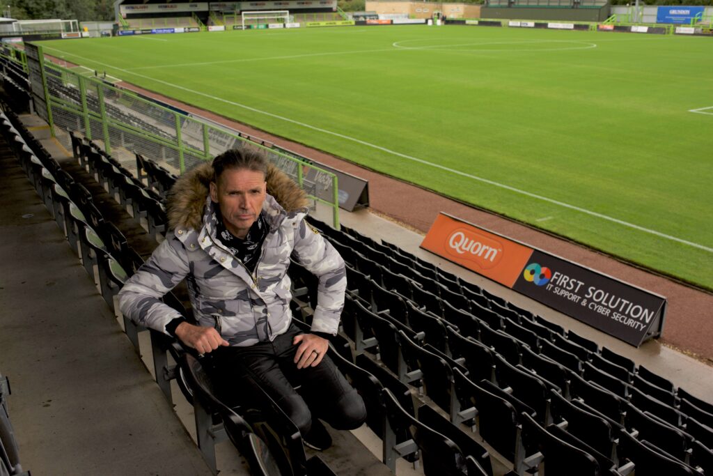 Forest Green's leftfield approach under maverick owner Dale Vince has seen naming rights to the stadium been given to a YouTube channel owned by iconic Red Dwarf actor Robert Llewellyn. 20.09.03 DALE VINCE DAY 02 SHOT 04 245 | Introducing The Fully Charged New Lawn with Red Dwarf legend Kryten