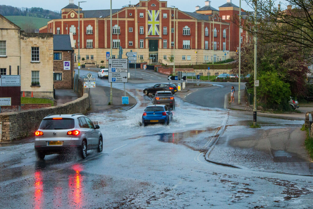 A burst water pipe is causing disruption around Stroud. Flooding on Bath Road at Wallbridge