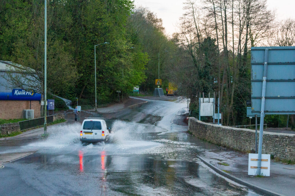 A burst water pipe is causing disruption around Stroud. Flooding on Bath Road at Wallbridge