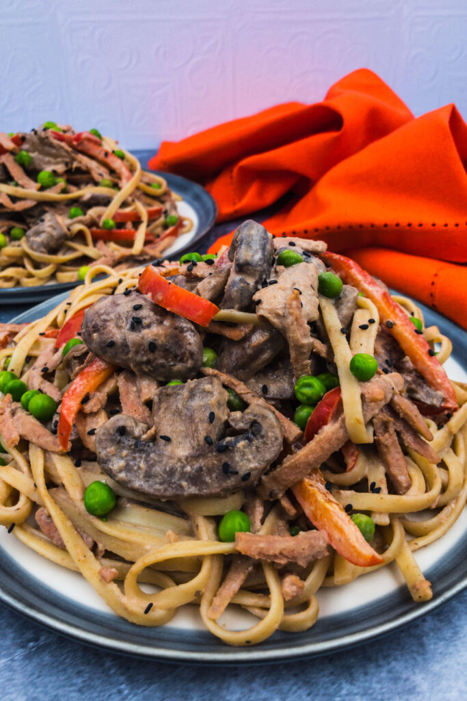 Our homemade tahini pasta sauce is combined with vegan bacon pieces and fresh vegetables to create a dreamy delicious creamy pasta sauce, writes Mandy Applegate from https://splashoftaste.com/vegan-pasta-tahini/ tahini pasta 21 | What's cooking? Have a go at making plant-tastic vegan tahini