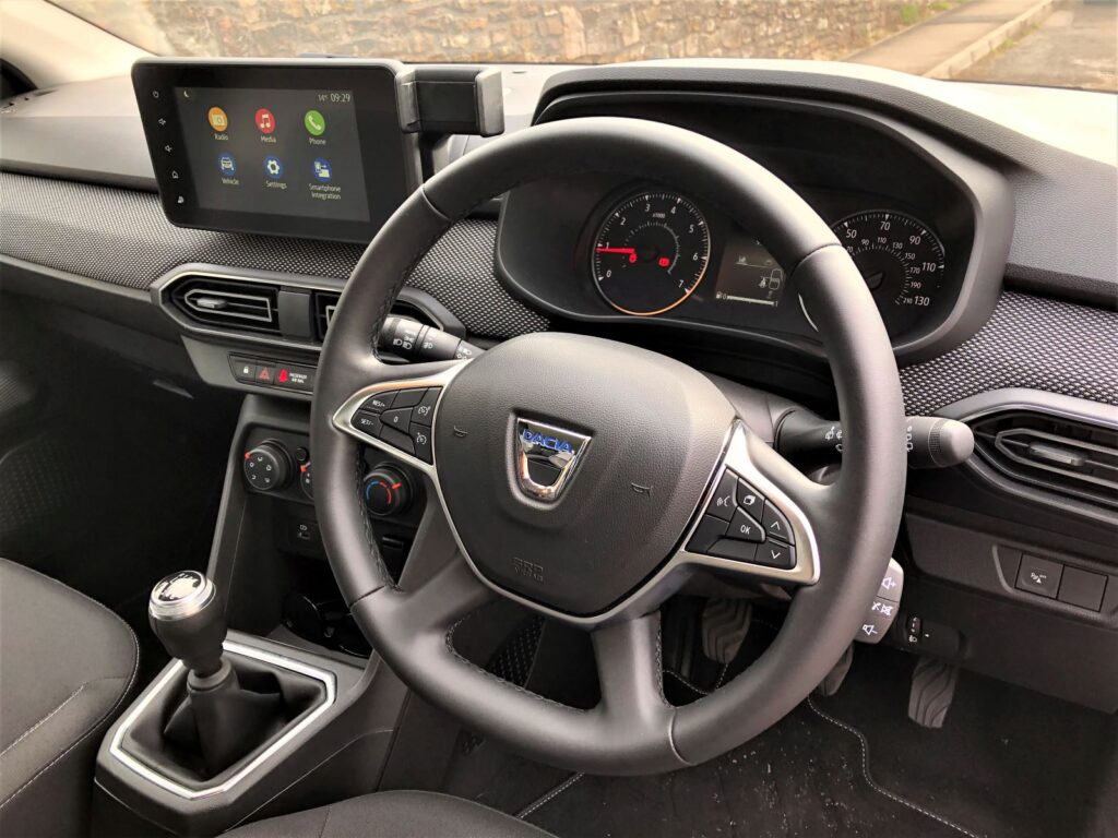 At less than £8k, Dacia’s latest Sandero is Britain’s most affordable car. Simon Hacker wonders if we're suckers for spending more. Dacia2 | Can cheap be cheerful?
