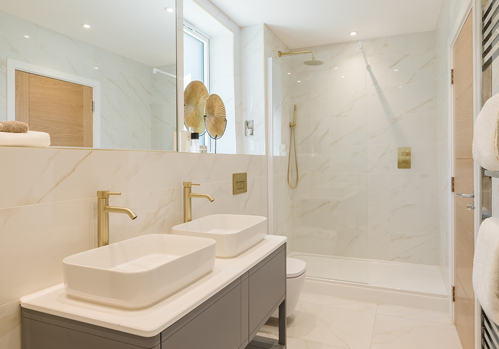A show home property with a £1.175m price tag is being unveiled on an exclusive Cotswold estate. PJL The Willow GWS en suite | £1m Cotswold show home unveiled in historic Standish location