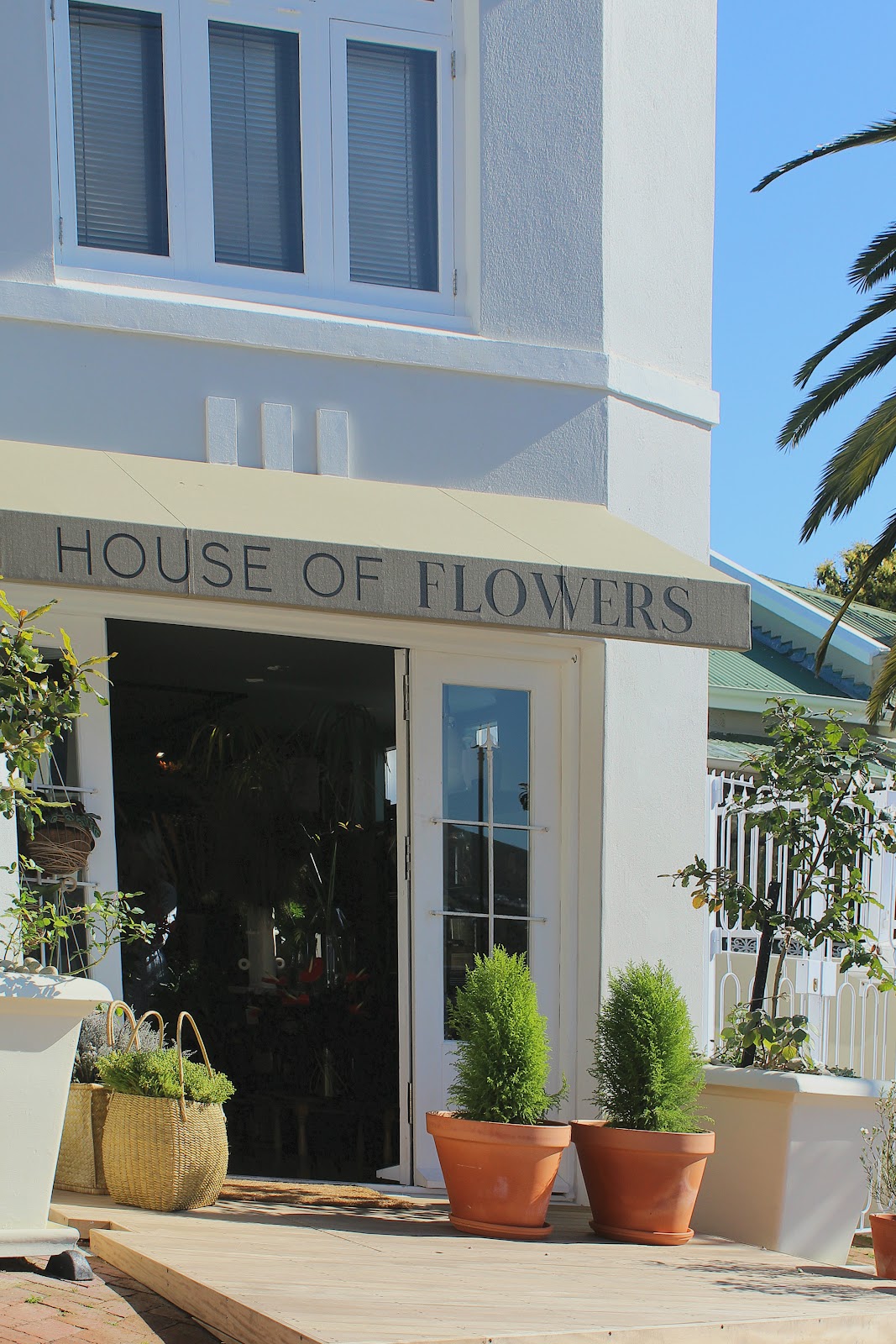 House of Flowers logo