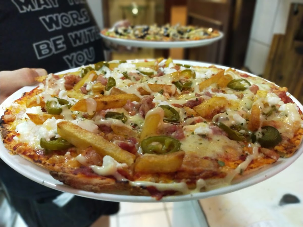 Julian's Café-Bar - Eikestad Mall. Logo