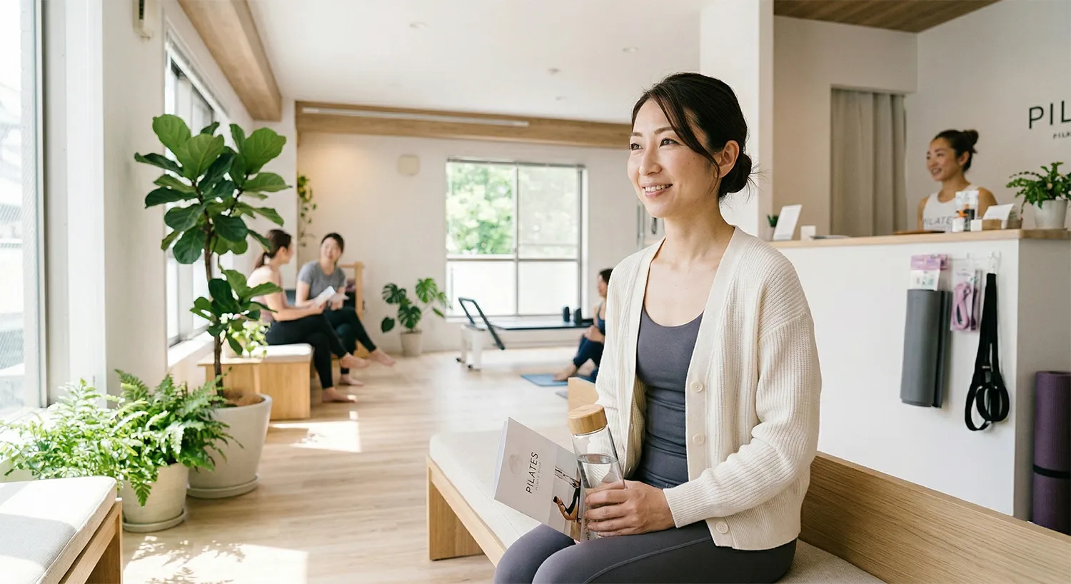 ピラティスをしてスッキリした表情の女性