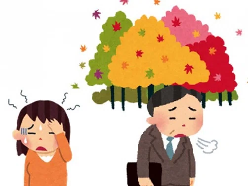 秋に体調や気分が悪くなっている人のイラスト
