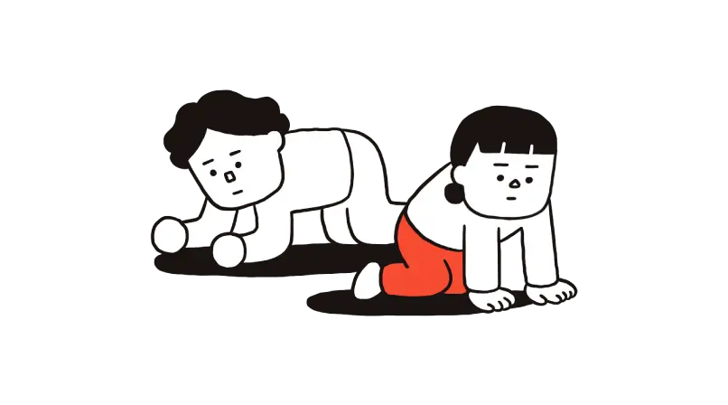 洞窟の中を歩く母親と父親
