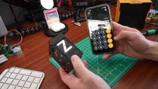 A phone calculator displaying the estimated 10 hours to assemble all 45 modules.