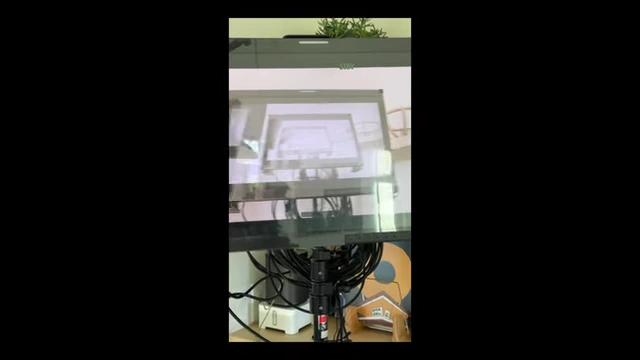 Osee Megamon 15S production monitor on a table with cables