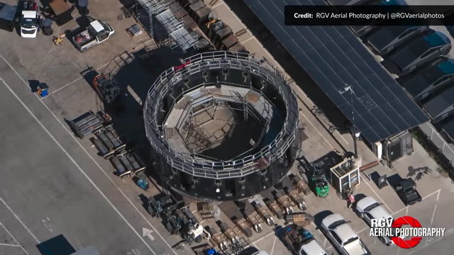 An aerial view showing a Version 2 booster stand awaiting Version 3 modifications, and a Version 3 ship transport stand in the rocket garden.