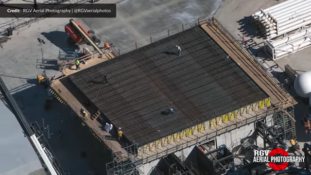 Workers installing a substantial amount of rebar for the commodities bunker roof, expected to be nearly a meter thick.