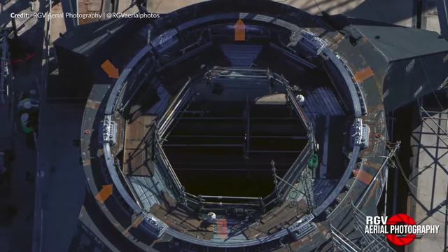An aerial view of the static fire stand with all six hold-down clamps installed and shielding to close the gap between the ship and the stand.