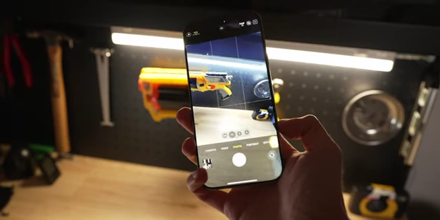 Demonstration of using the camera control button to quickly launch the camera