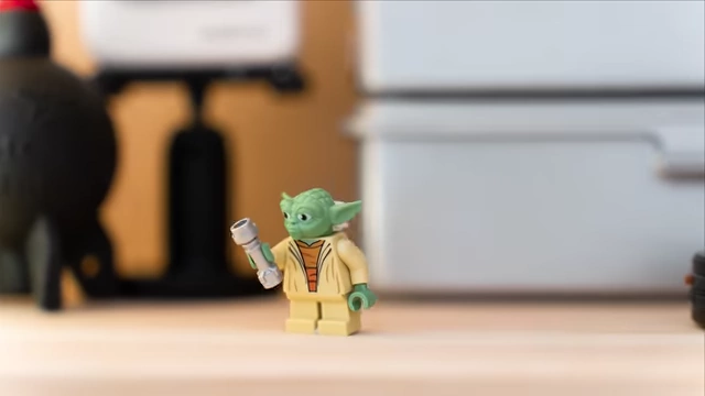 A Lego Yoda holding a lightsaber, representing the "Lego lightsaber" creative edge.