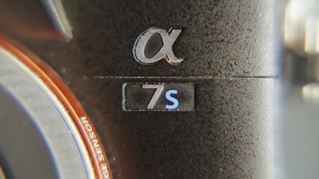 A close-up of the "α 7S" logo on the Sony A7S3 camera.