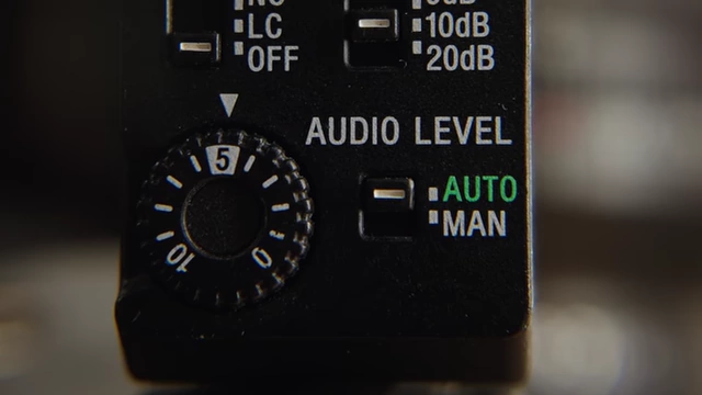 The audio level dial on the Sony ECMB10, set to "AUTO" for hassle-free recording.