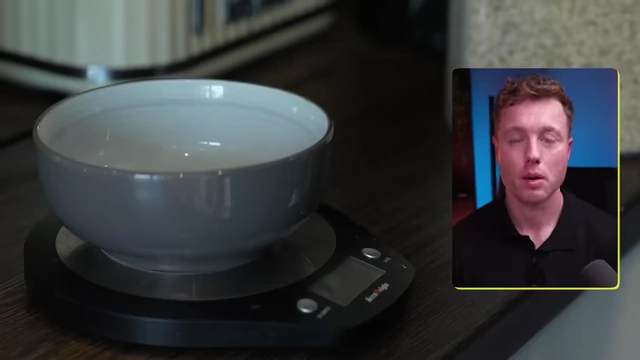 A food scale with a bowl, emphasizing the importance of weighing ingredients for accurate tracking.