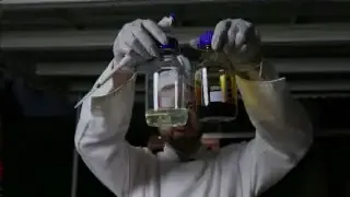 The two main solutions, Solution A (clear) and Solution B (dark brown), ready for mixing.