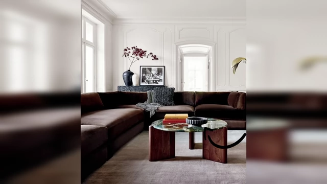 A sophisticated living room showcasing a mix of matte textures and a subtle glossy coffee table as an accent.