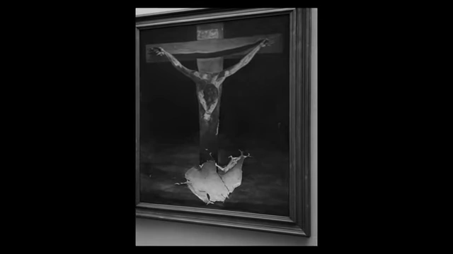 The "Christ of Saint John of the Cross" painting with a large, visible tear after being attacked in 1961
