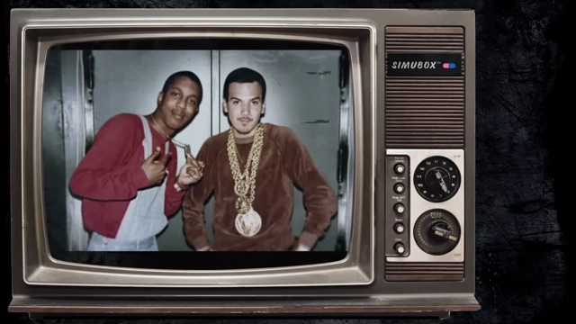 Rappers wearing heavy gold chains, representing commercialized hip-hop