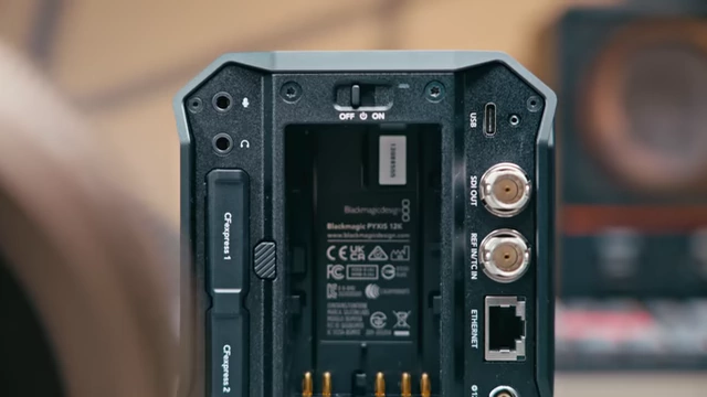 Rear view of the PYXIS 12K showing ports including USB-C, SDI out, Time Code, Ethernet, and 2-pin Lemo, along with CFexpress slots