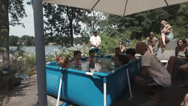 Attendees participating in an ice bath session at the wellness retreat