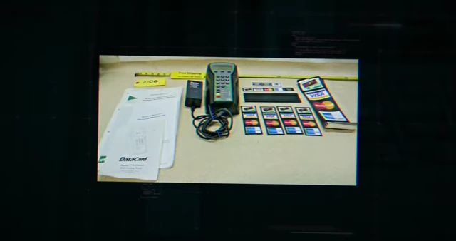 A Datacard payment terminal along with various smart cards, representing the American market target.).